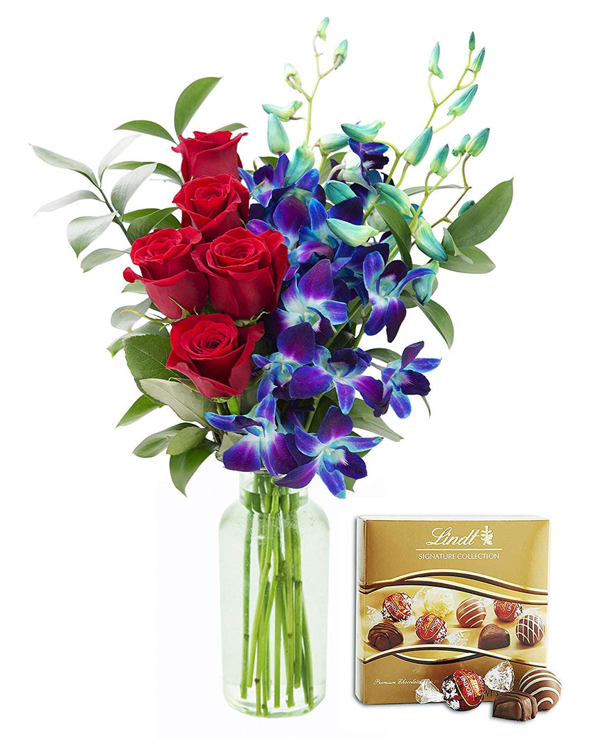 KaBloom Sapphire Red Bouquet of Fresh Red Roses and Exotic Blue Orchids with Vase and One Box of Lindt Chocolates, 1 Set